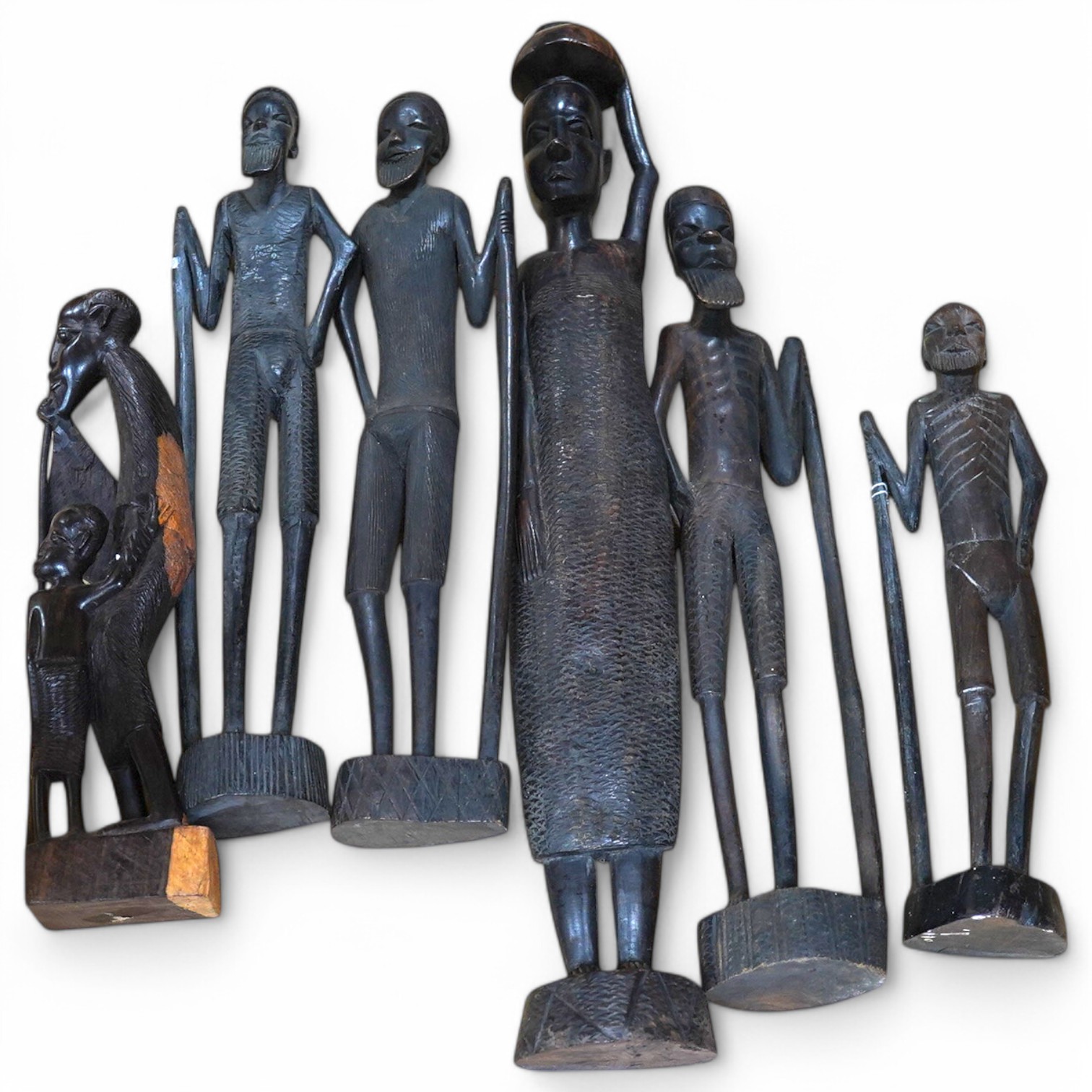 Six African tribal carved wood figures, tallest 48cm high. Condition - good